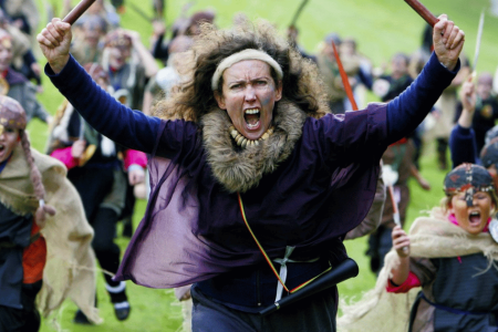 Mags Bryne with primary school pupils staging a mock Viking invasion of Stormont as part of Reach.In Out programme, 2007.